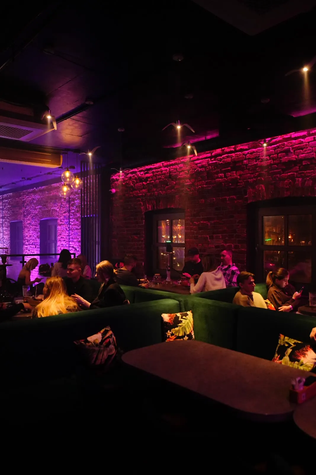 Green velvet booths at Selection — room for a bigger group of friends